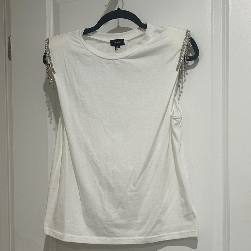 Elegant White Sleeveless Top with Silver Details